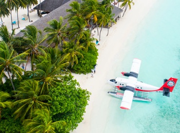 Small plane landing on a remote island
